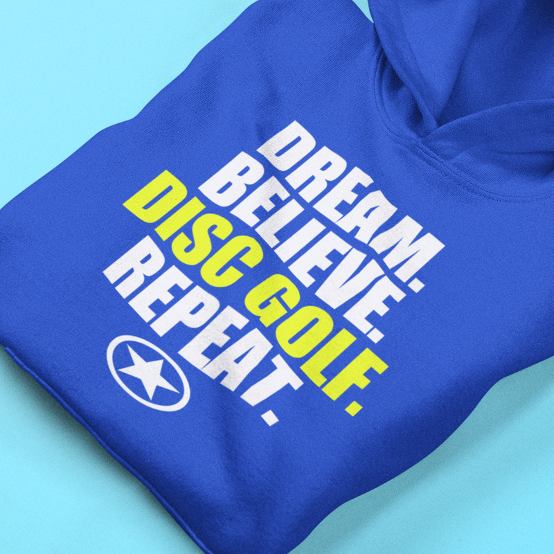 DREAM. BELIEVE. DISC GOLF. REPEAT. Unisex Heavy Blend™ Hooded Sweatshirt