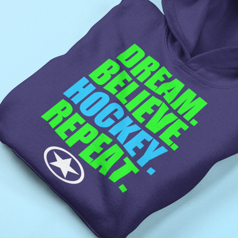 DREM. BELIEVE. HOCKEY. REPEAT. Youth Heavy Blend Hooded Sweatshirt